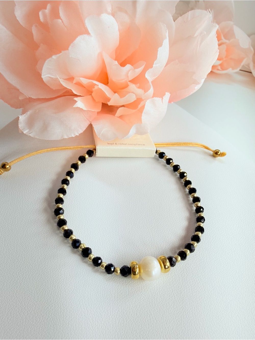 Elegant Black Beaded Bracelet with Pearl and Gold Accents